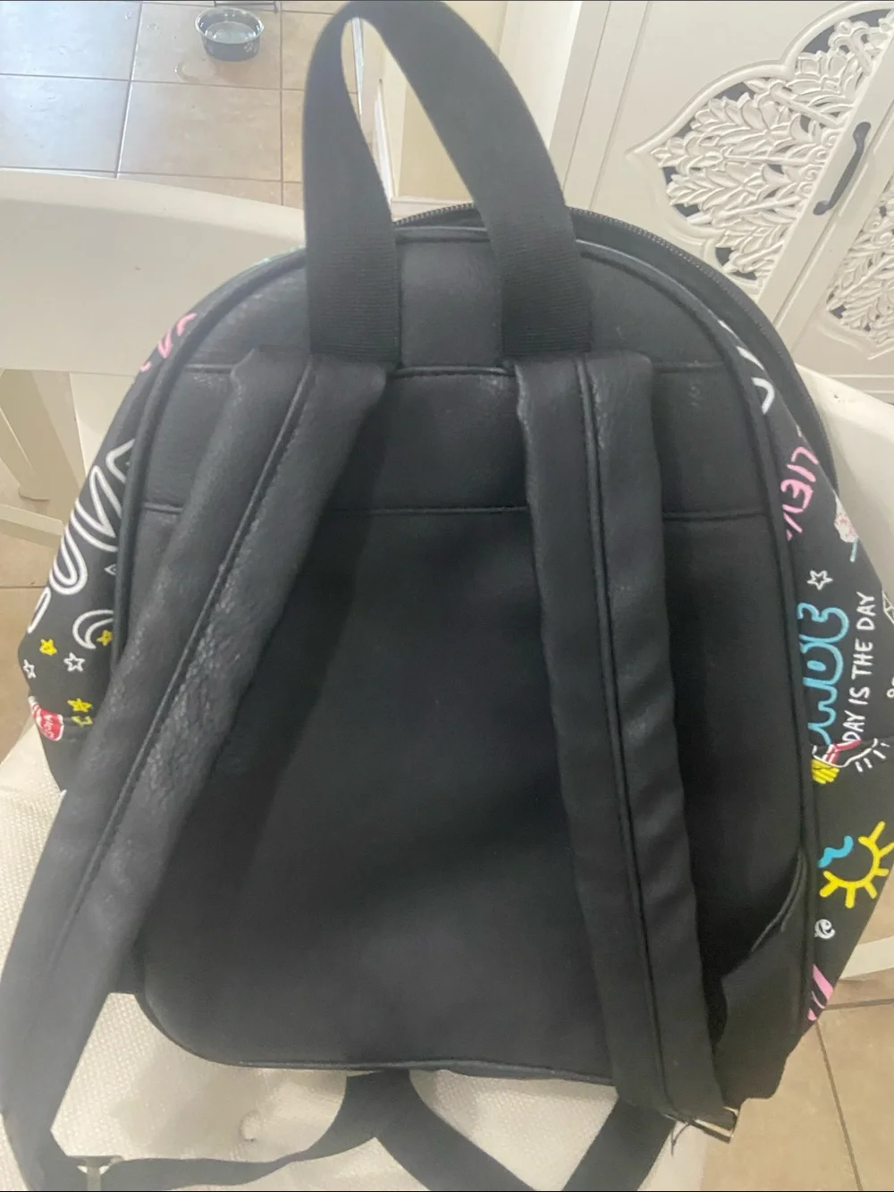 Claire's Black Mini Backpack with Colorful Graphic Icons